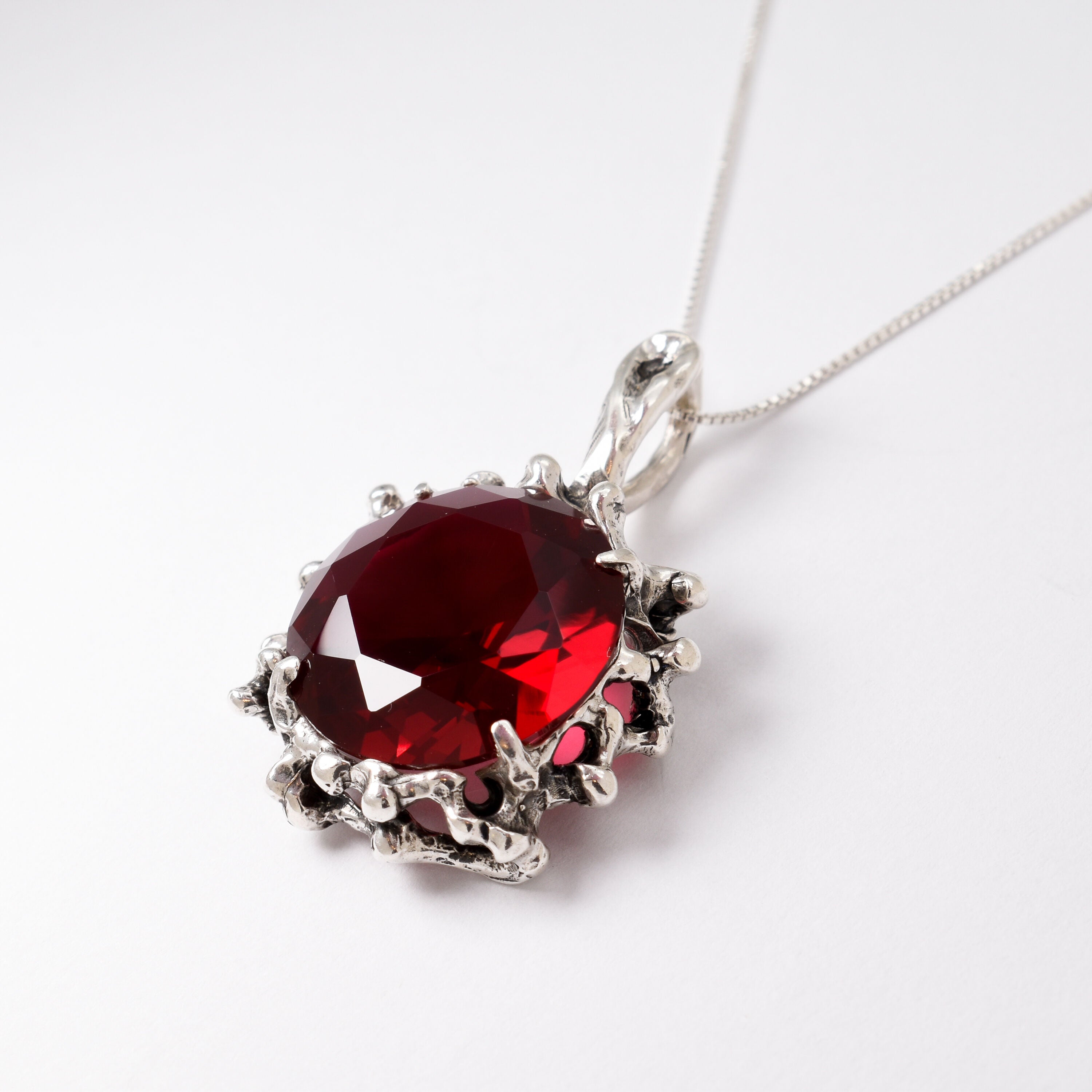 Stunning Created Ruby Pendant in 925 Sterling Silver, symbolizing passion and purity, perfect for daily wear and gifting.