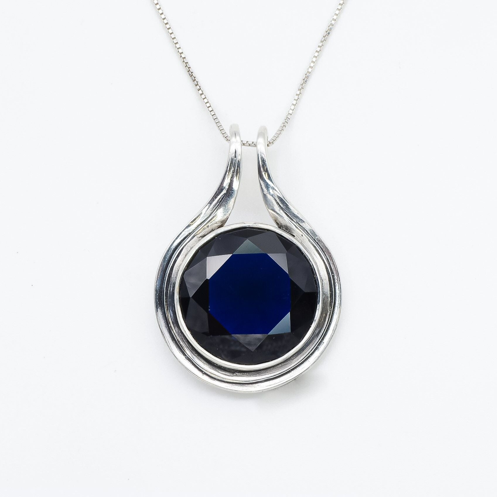 Gorgeous Created Sapphire Pendant in 925 Sterling Silver, a timeless piece symbolizing faithfulness, perfect for birthday gifting.