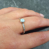 Stylish Caribbean Larimar ring offering a serene look, ideal for beach weddings or stress-relief gifts.