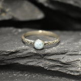 Boho-style ring with unique Larimar cabochon, a thoughtful March birthstone gift or vacation accessory.