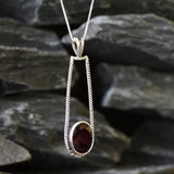 Stunning Created Ruby Pendant in 925 Sterling Silver, showcasing an Oval Ruby that symbolizes love and devotion, perfect gift choice.