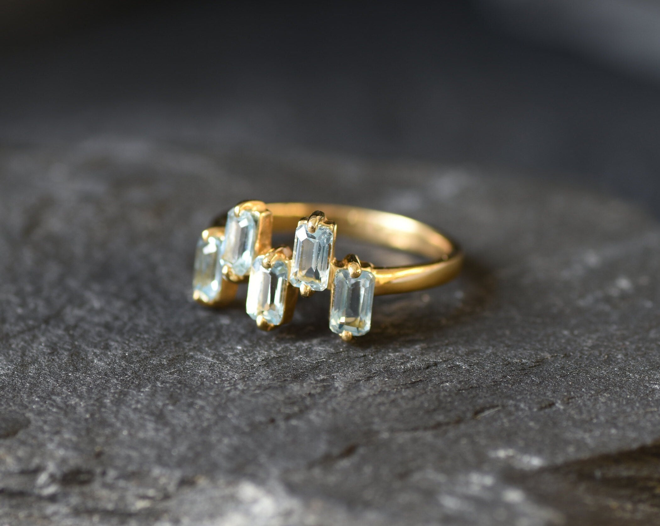 Luxurious blue topaz ring perfect for elegant styling or gemstone collectors.