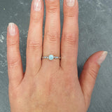 Minimalist Larimar ring offering everyday elegance, lovely as a self-love token or bridesmaid gift.
