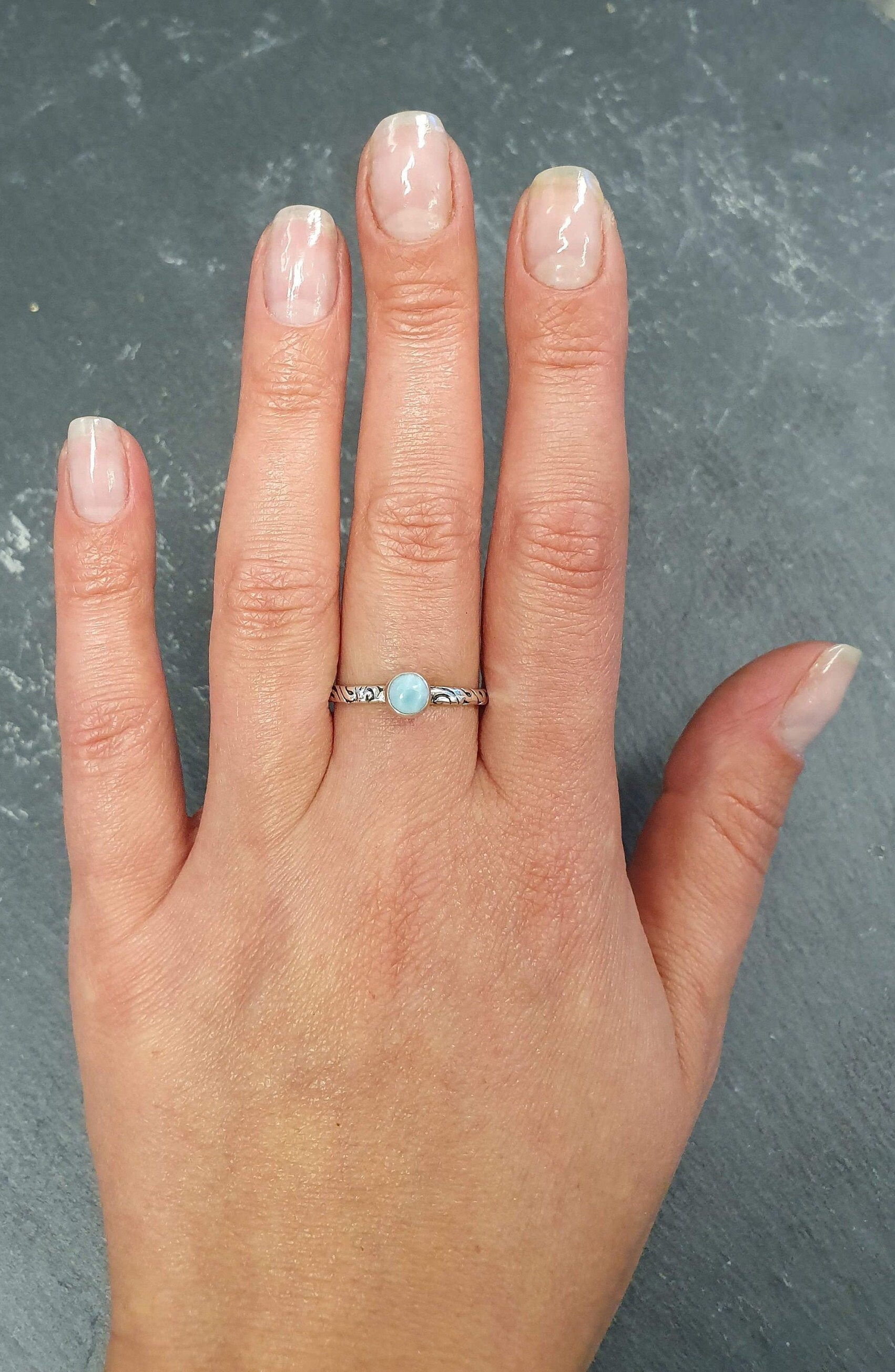 Minimalist Larimar ring offering everyday elegance, lovely as a self-love token or bridesmaid gift.