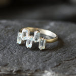 A modern topaz ring for stylish nights out or birthstone lovers.