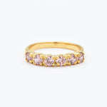 Morganite gold ring with 1 carat total diamond cut stones and polished gold band