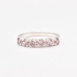 Morganite ring set in sterling silver band showcasing pink stones and fine craftsmanship