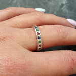 Elegant channel-set natural blue sapphire ring in 925 sterling silver, perfect for daily wear and special occasions.