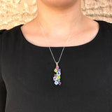 Elegant Emerald Pendant in 925 Sterling Silver, showcasing a stunning green gem, a meaningful gift for May birthdays and special occasions.