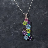 Natural Emerald Pendant in 925 Sterling Silver, symbolizes growth and harmony, perfect for everyday wear and May birthdays.