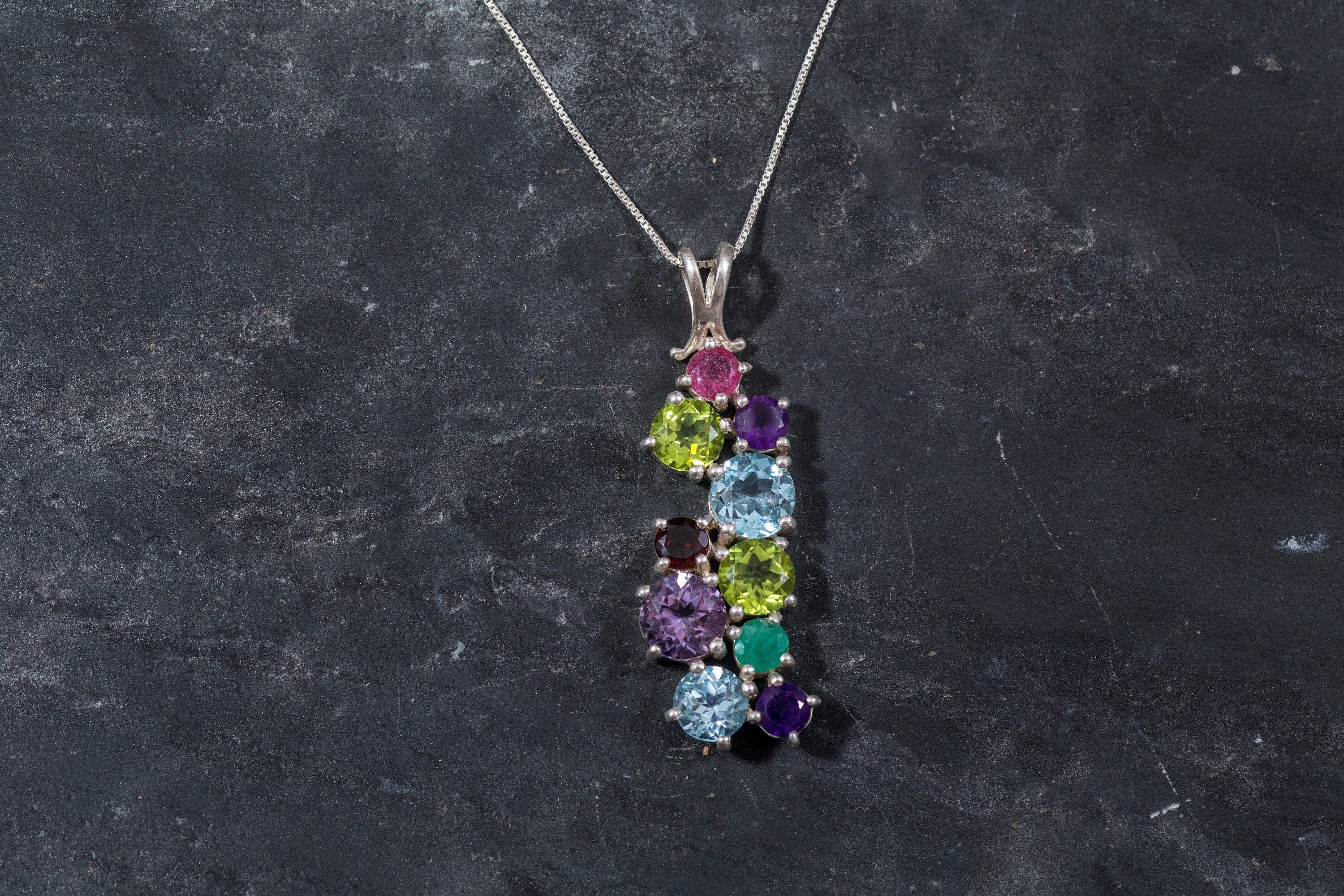 Natural Emerald Pendant in 925 Sterling Silver, symbolizes growth and harmony, perfect for everyday wear and May birthdays.