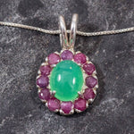 Featuring a polished Chrysoprase center and Ruby accents, this natural gemstone necklace promotes inner peace and vitality, ideal for thoughtful everyday wear.