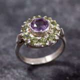 Natural Amethyst and Peridot Ring with silver band, perfect for adding colorful sparkle to any jewelry collection