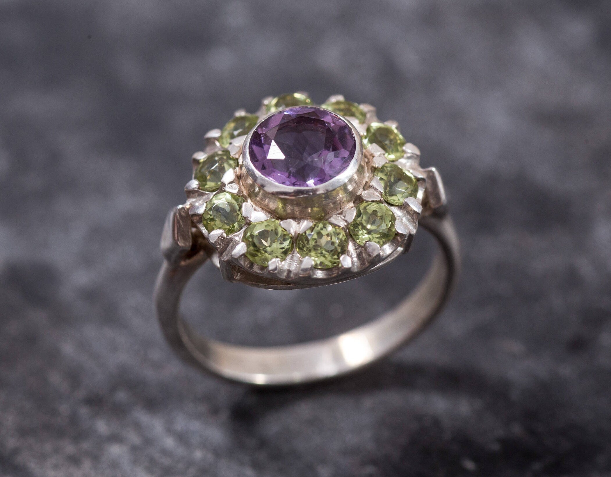Natural Amethyst and Peridot Ring with silver band, perfect for adding colorful sparkle to any jewelry collection