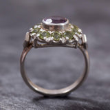 Natural Amethyst and Peridot Ring with silver band, perfect for adding colorful sparkle to any jewelry collection