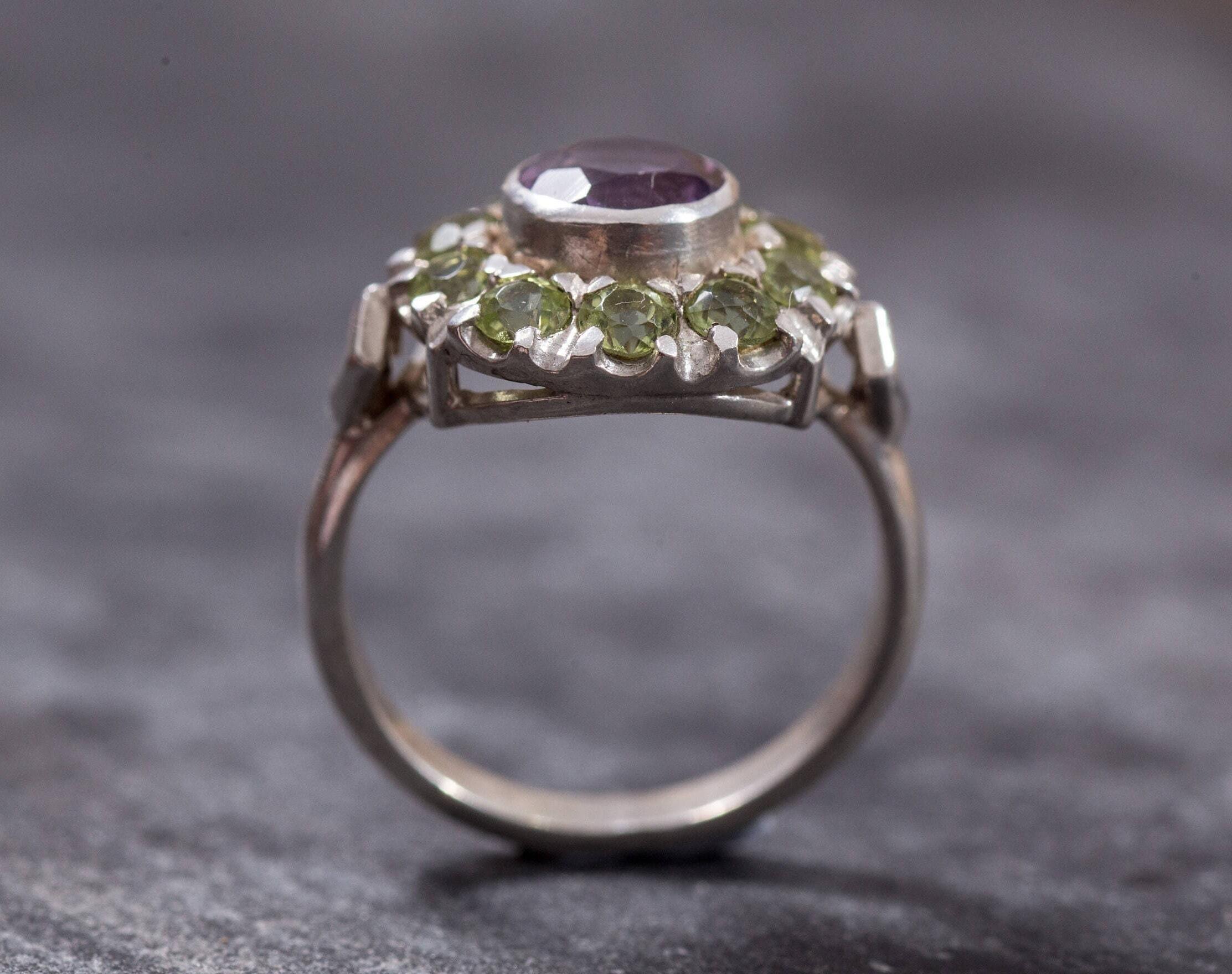 Natural Amethyst and Peridot Ring with silver band, perfect for adding colorful sparkle to any jewelry collection