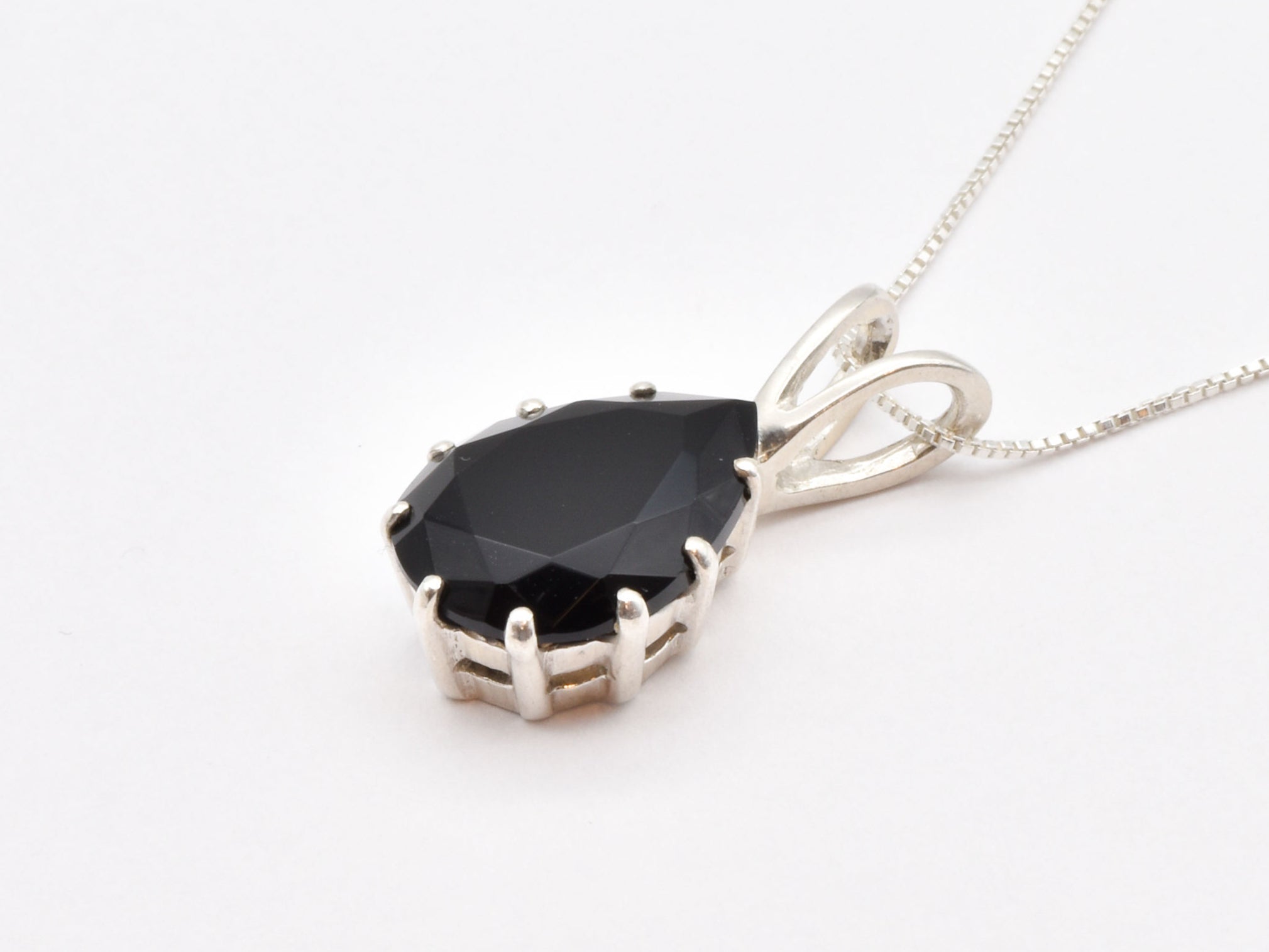 This Onyx Pendant offers dramatic contrast for monochrome styling.