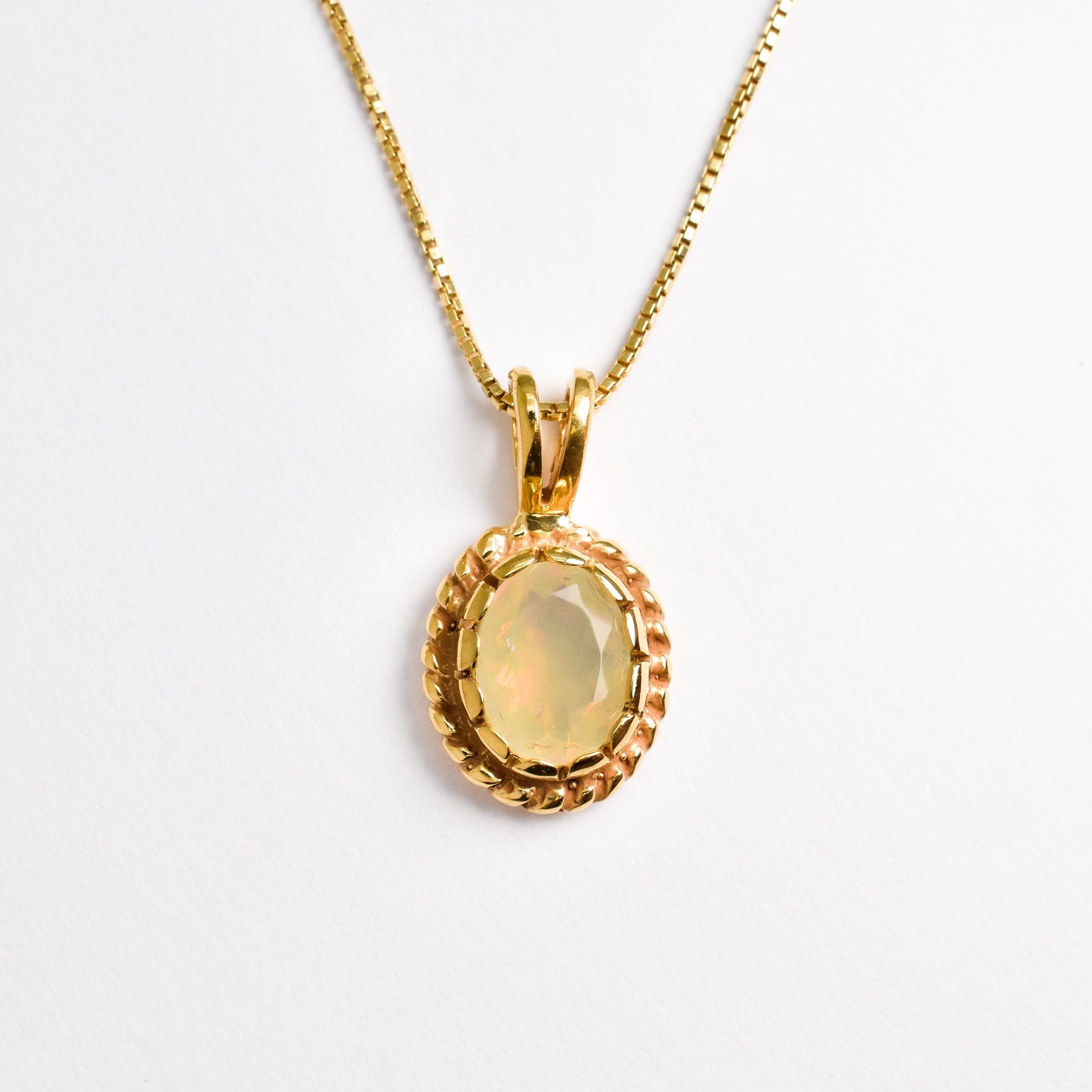 Solitaire Natural Opal Necklace crafted in 18k yellow gold vermeil over solid 925 sterling silver, in oval cut, and prong setting. Vintage Opal Pendant ideal for special occasions, for layering necklaces or wearing solo. October birthstone stimulates imagination and love.