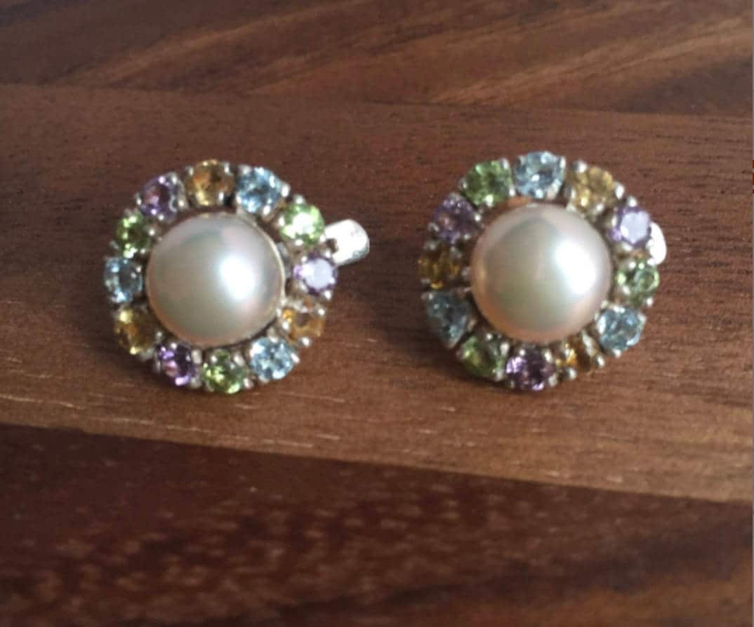 Natural Pearl earrings surrounded by multicolored gemstones in a classic round design, perfect for vintage jewelry lovers, promotes calmness and grace, ideal as a June birthstone gift for elegant events.