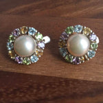 Natural Pearl earrings surrounded by multicolored gemstones in a classic round design, perfect for vintage jewelry lovers, promotes calmness and grace, ideal as a June birthstone gift for elegant events.