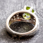 Natural Peridot dress ring with vivid green gemstone, perfect for spring weddings or romantic dinners.