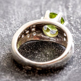 Natural Peridot dress ring with vivid green gemstone, perfect for spring weddings or romantic dinners.
