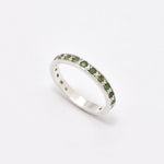 Stunning channel-set natural emerald ring in 925 sterling silver, a meaningful May birthstone gift for any occasion.