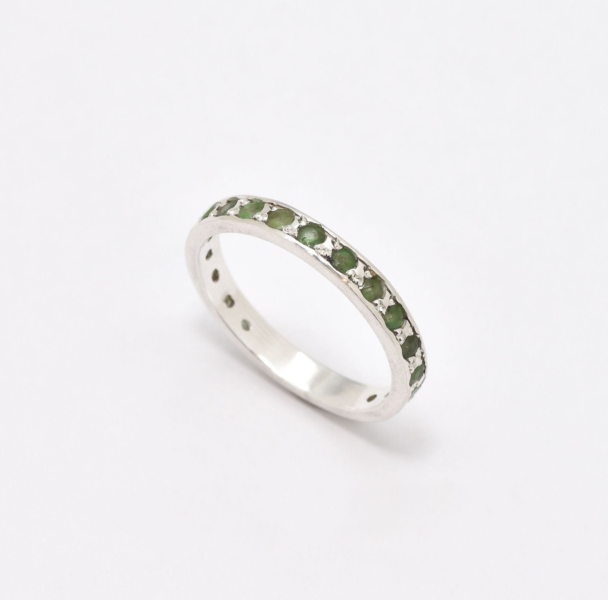 Stunning channel-set natural emerald ring in 925 sterling silver, a meaningful May birthstone gift for any occasion.