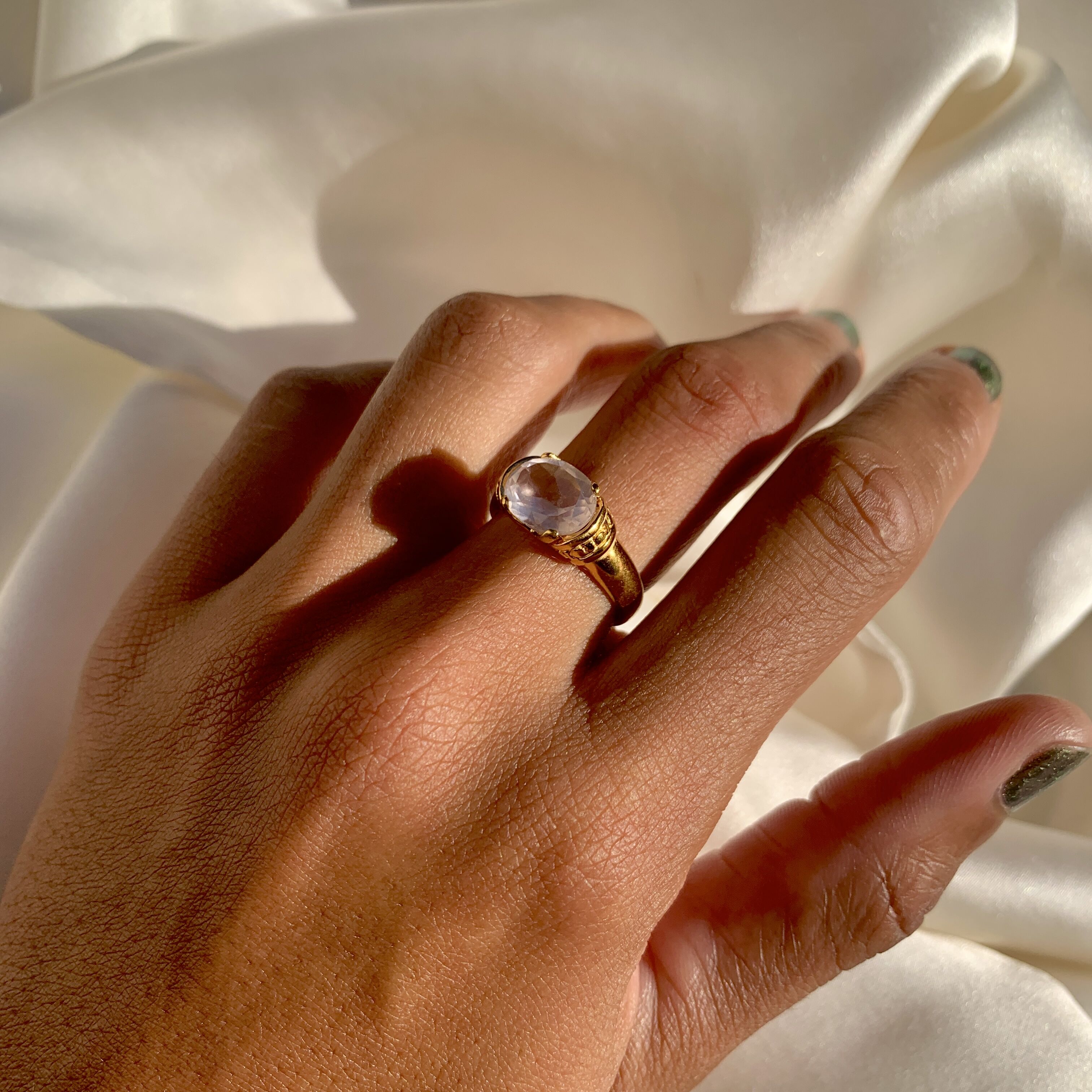 Natural Pink Rose Quartz Ring set in 18k gold vermeil over solid 925 sterling silver, pink solitaire ring worn in middle finger for size reference.