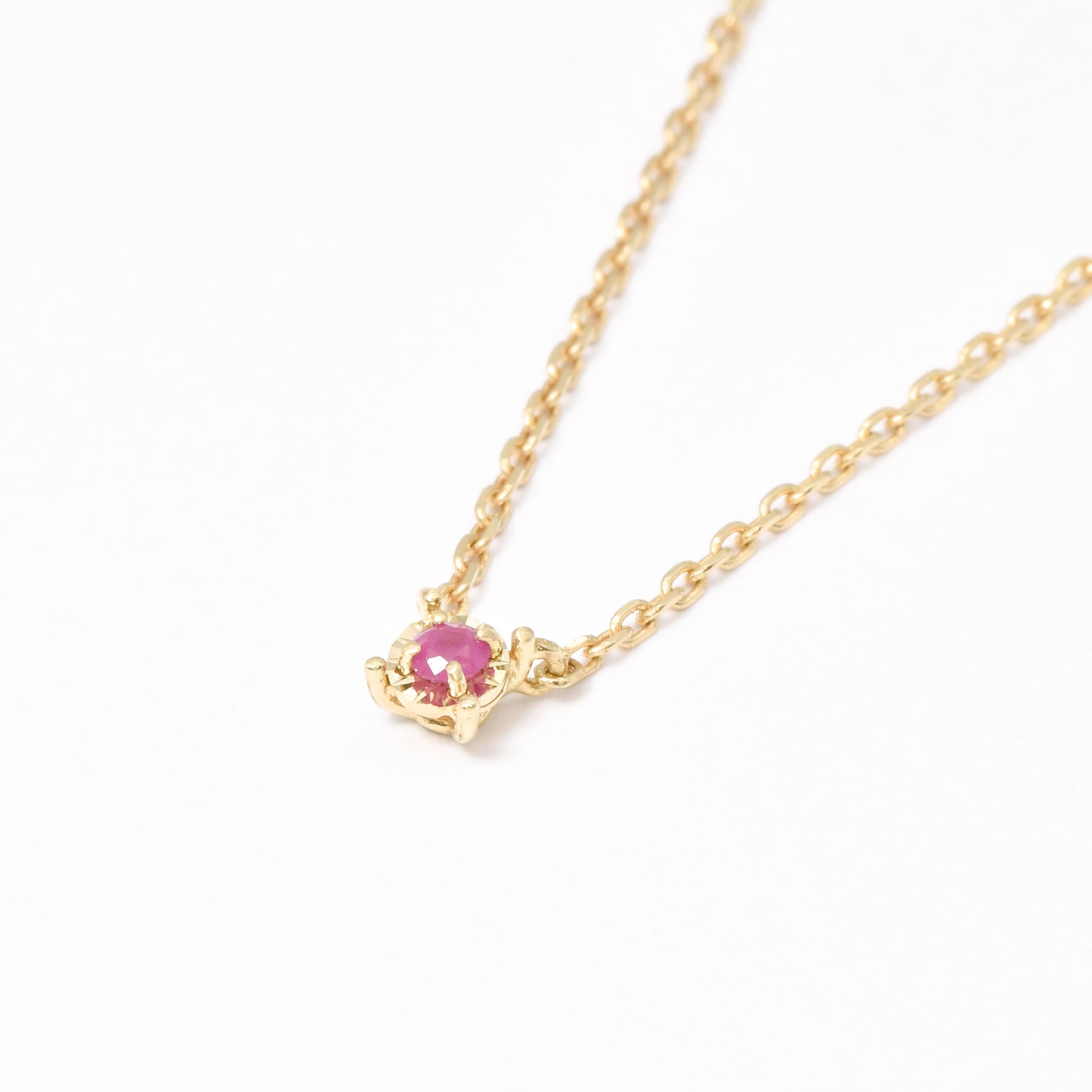 Genuine Ruby Necklace set in Solid 14k Yellow Gold, in a round cut, and prong setting. July birthstone pendant symbolizing passion, protection, and vitality. Round solitaire ruby necklace perfect gift idea for her, for special occasions, and an ideal anniversary or birthday gift.