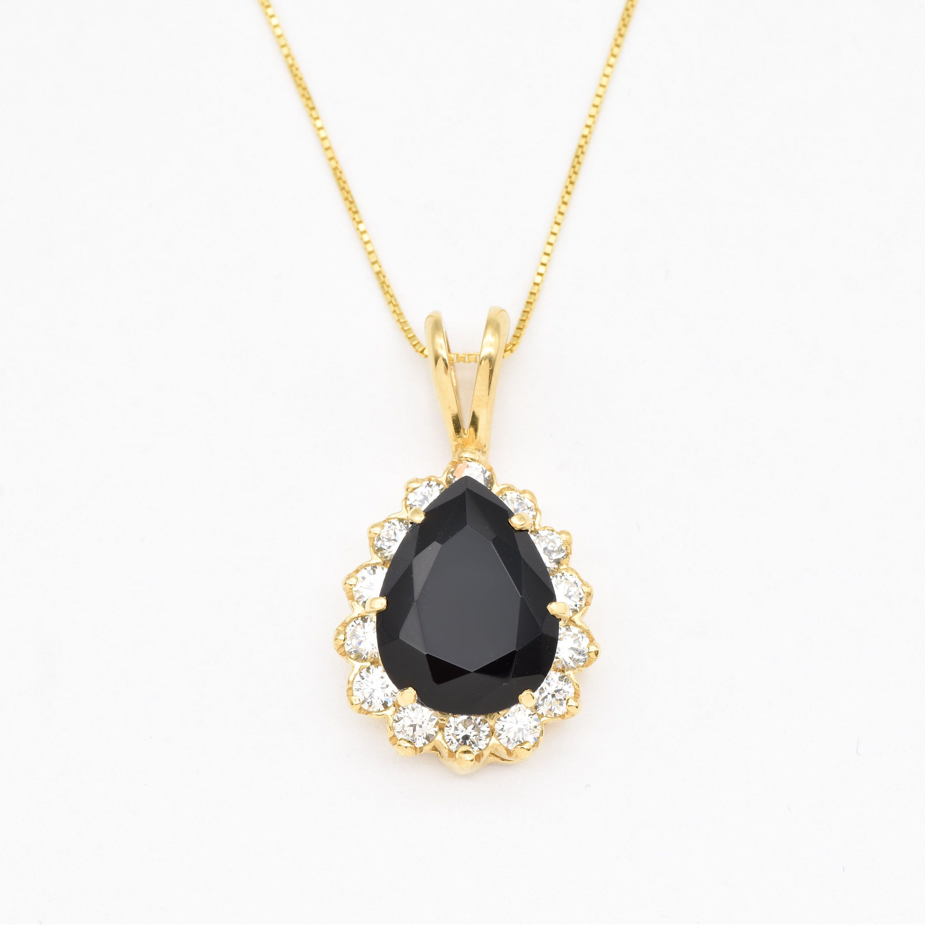 Onyx Pendant Necklace in gold vermeil exudes rich elegance for formal evenings.