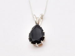 Onyx Pendant adds bold elegance to formal evening looks.