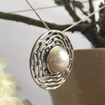 Natural Pearl pendant perfect for classic jewelry fans, known to bring tranquility and intuition, cherished as a bridal heirloom or birthday keepsake.