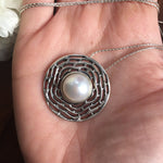 Natural Pearl necklace in a sterling silver circle design, offers a touch of serenity and elegance, perfect for meaningful gifts like Mother's Day or graduations.