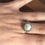Natural Pearl ring surrounded by Amethyst and Blue Topaz stones, supports peace and communication, an elegant jewelry pick for formal occasions.
