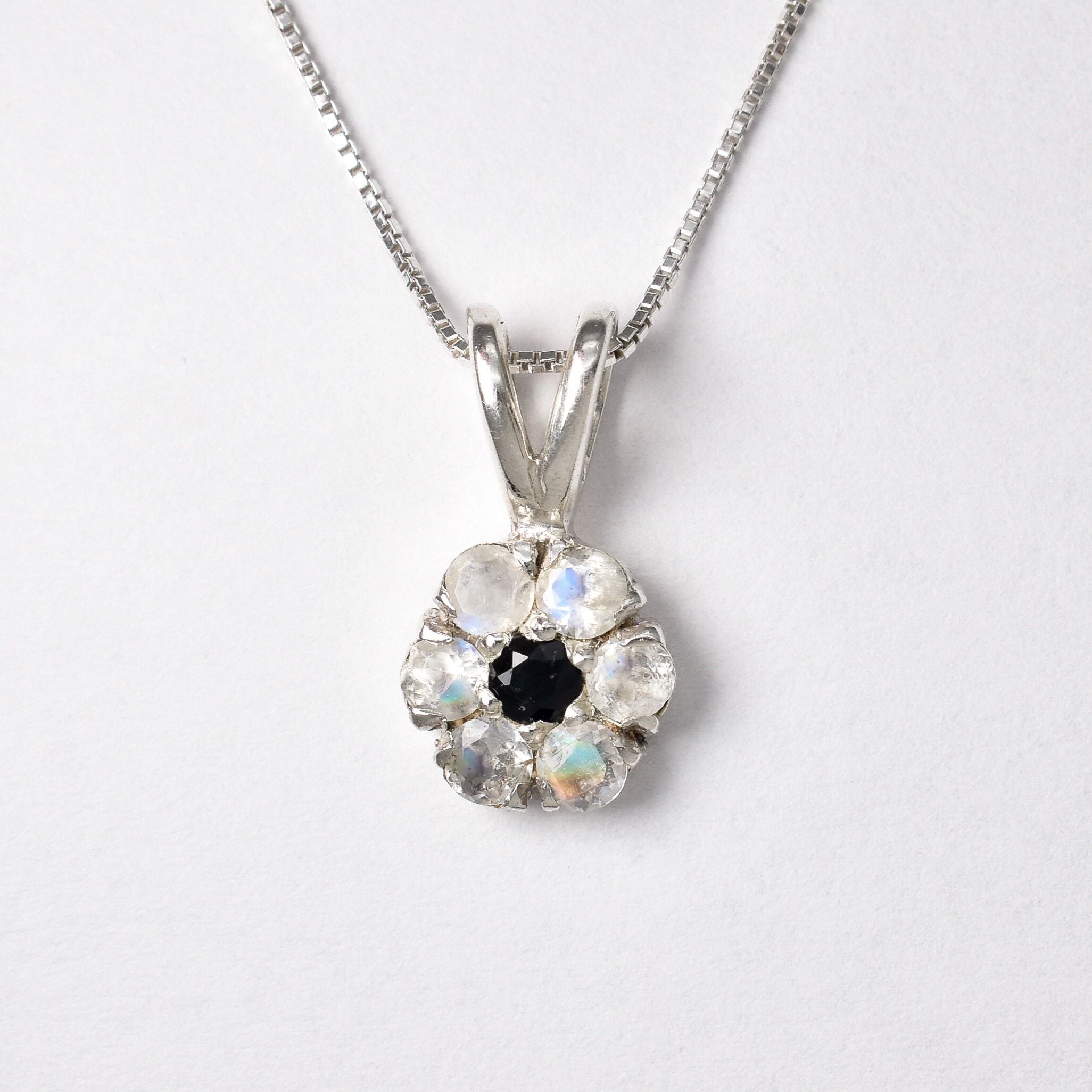 Moonstone Flower Pendant - Genuine Sapphire Necklace - White Flower Necklace made in 925 Sterling Silver. Ideal for everyday wear and perfect for birthday gifting and special occasions.
