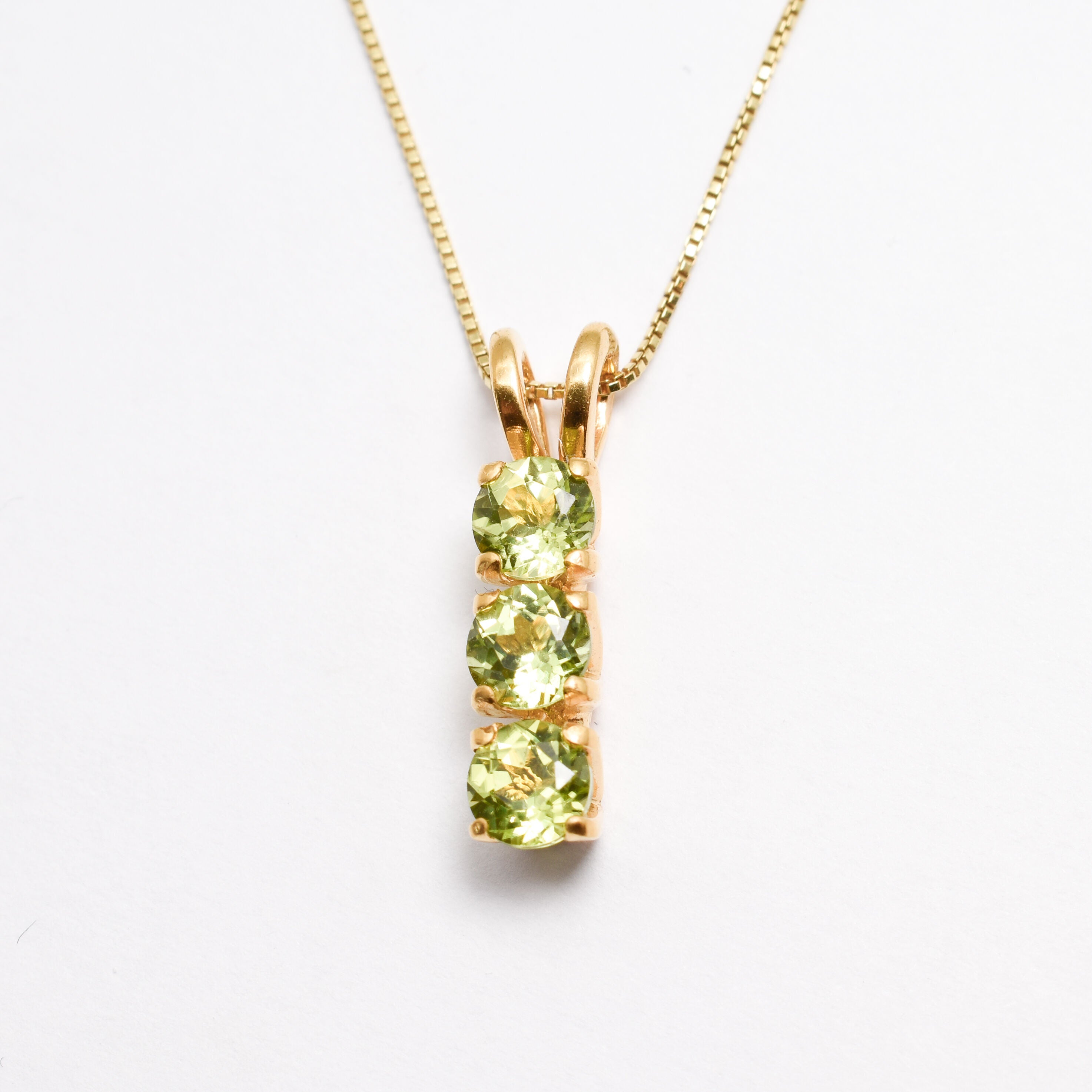 Gold Peridot Necklace Front View in White Background