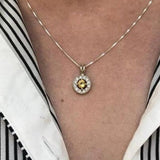 Natural Peridot Pendant Necklace styled with a black and white striped blouse for a polished yet fresh everyday look, ideal for adding a gemstone accent to neutral workwear.