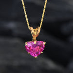 A dazzling Pink Alexandrite gemstone pendant in heart shape paired with an elegant gold chain, symbolizes affection and clarity, best for birthdays and milestones