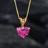 A dazzling Pink Alexandrite gemstone pendant in heart shape paired with an elegant gold chain, symbolizes affection and clarity, best for birthdays and milestones