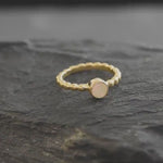 Yellow Fire Opal Bubble Band Ring in sterling silver with bezel set round cut, showcasing flashes of fire colors in a tennis band design for an elegant jewelry style. This durable and timeless piece is a meaningful October birthstone gift idea, symbolizing passion and inspiration. Ideal for birthdays, weddings, anniversaries, and evening occasions where a touch of unique brilliance is desired.