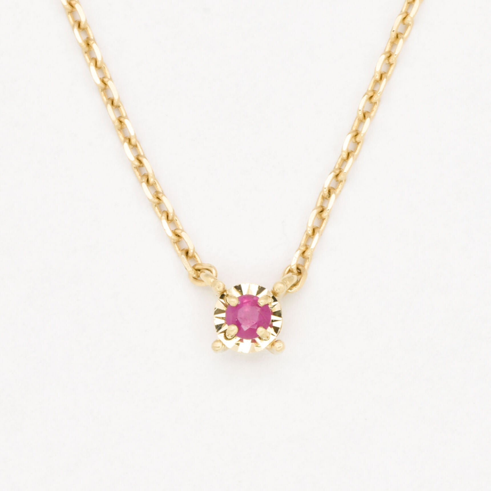 Dainty Natural Ruby Necklace set in Solid 14k Yellow Gold, in a round cut, and prong setting. July birthstone pendant symbolizing passion, protection, and vitality. Round solitaire ruby necklace perfect gift idea for her, for special occasions, and an ideal anniversary or birthday gift.