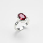 Created Ruby Ring made in 925 Sterling Silver with Oval Created Red Ruby in Bezel setting, July Birthstone gift idea, symbolizes nobility, purity, and passion, ideal for everyday wear and perfect for birthday gifting and special occasions.
