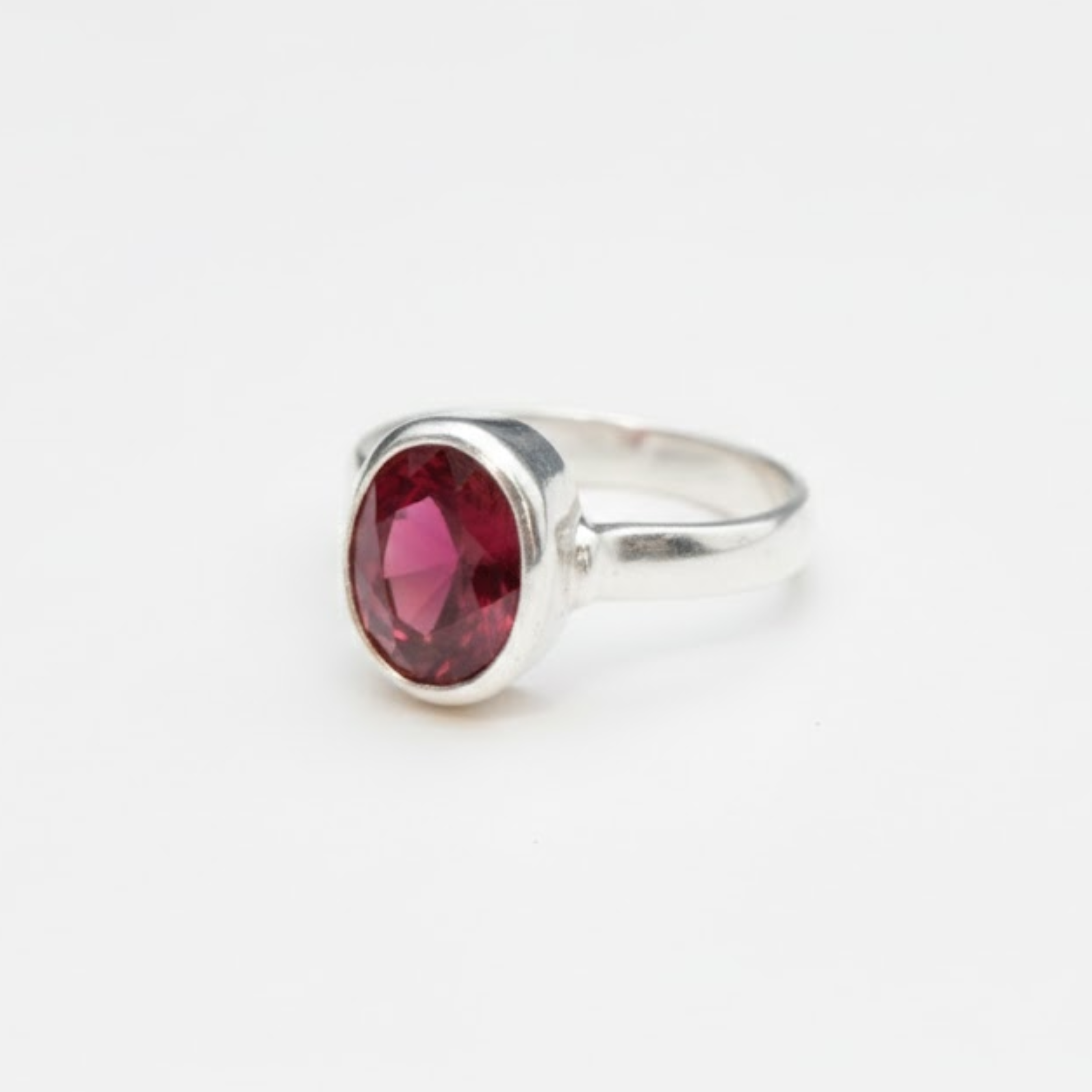 Stylish 925 Sterling Silver Ruby Ring featuring an Oval Created Red Ruby, ideal for celebrations and everyday elegance.