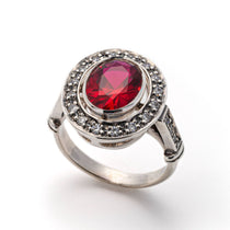Created Ruby Ring made in 925 Sterling Silver with Oval Created Red Ruby in Bezel setting, July Birthstone gift idea, symbolizes nobility, purity, and passion, ideal for everyday wear and perfect for birthday gifting and special occasions.