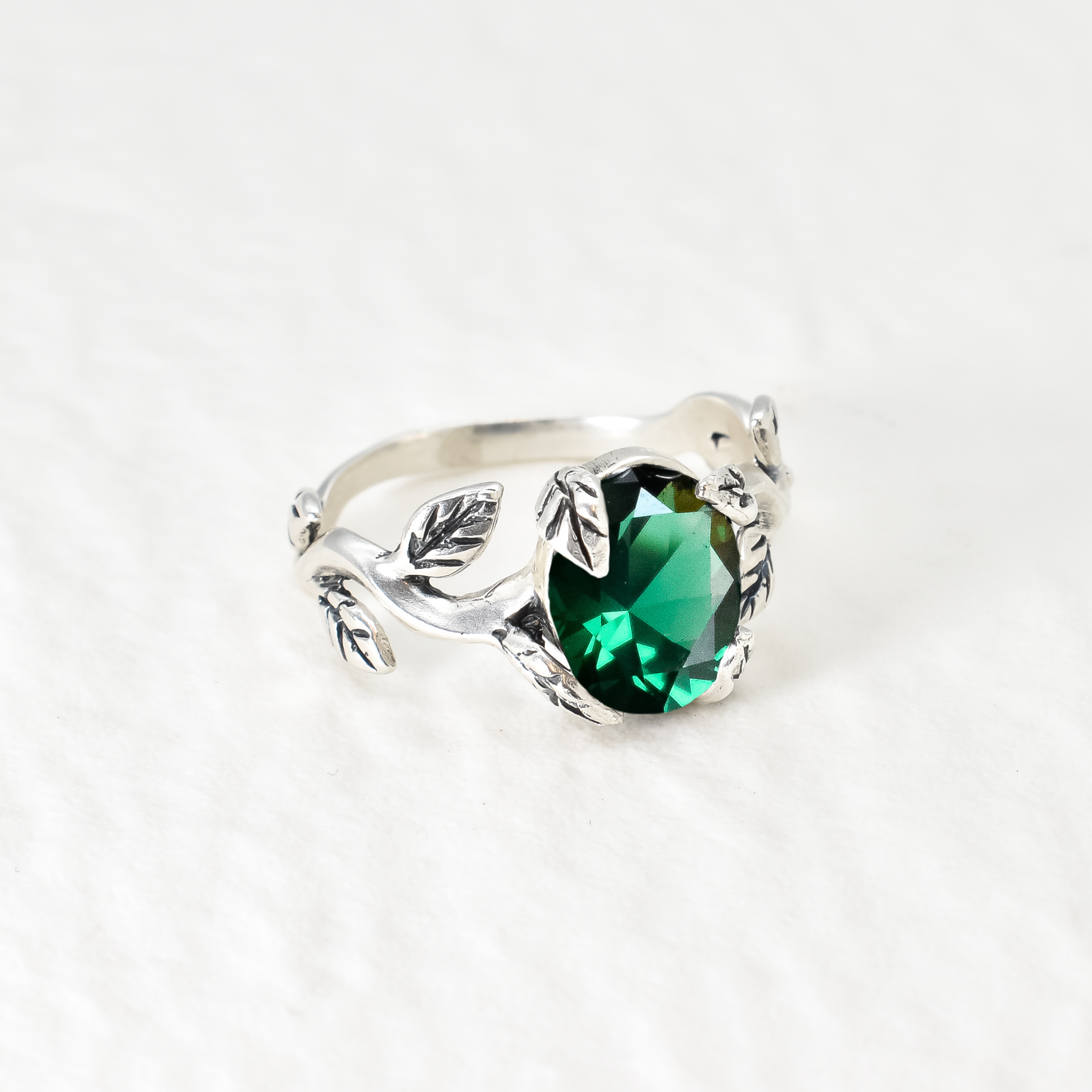Stunning 925 Sterling Silver Emerald Ring featuring an oval created green emerald, a beautiful gift for May birthdays.