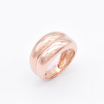 Rose gold plated edition of the solid 925 sterling silver band ring, photographed against a soft background.