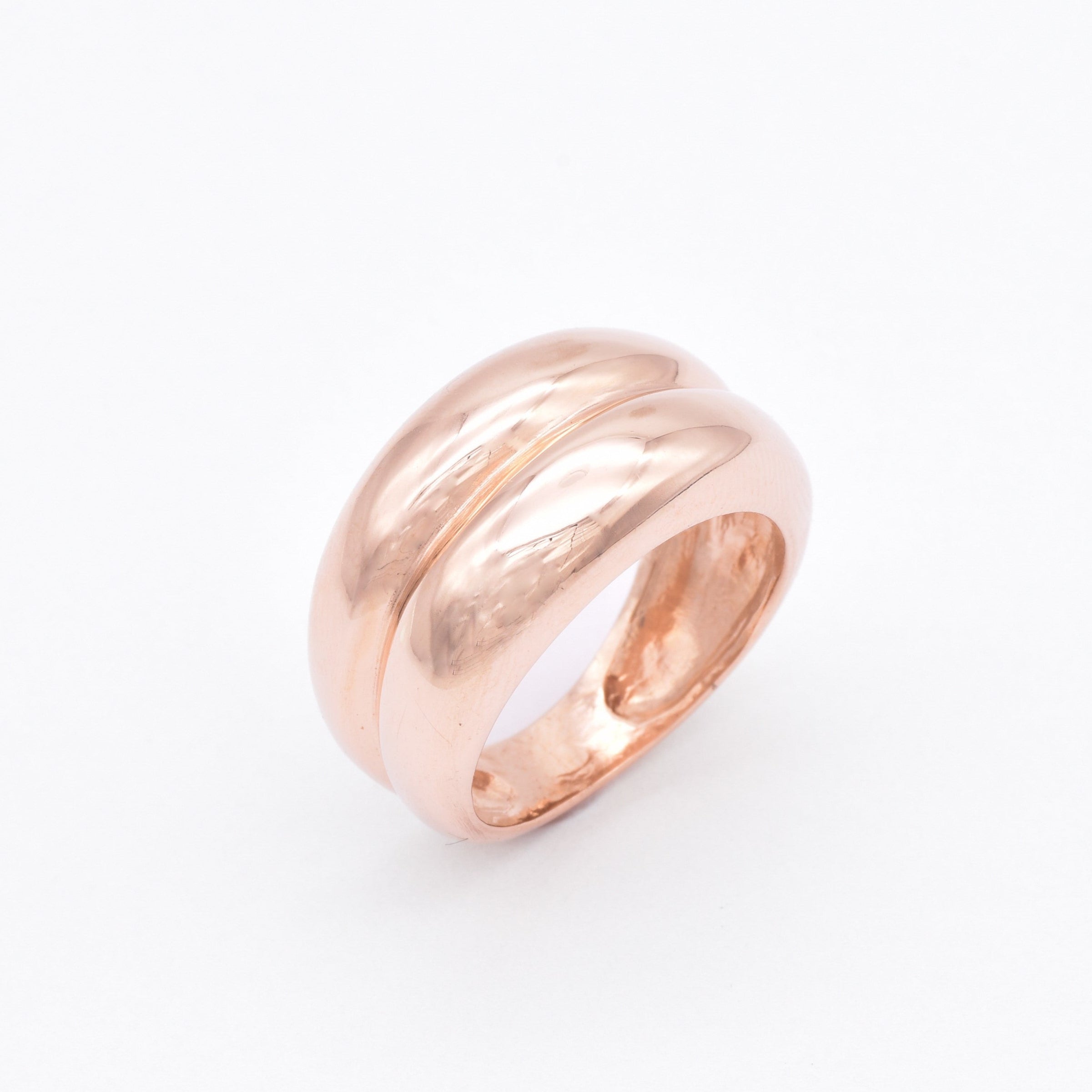Rose gold plated edition of the solid 925 sterling silver band ring, photographed against a soft background.