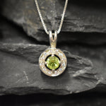Round Peridot and CZ pendant on silver chain, elegant yet subtle style that supports emotional renewal, ideal for anniversaries or personal milestones.
