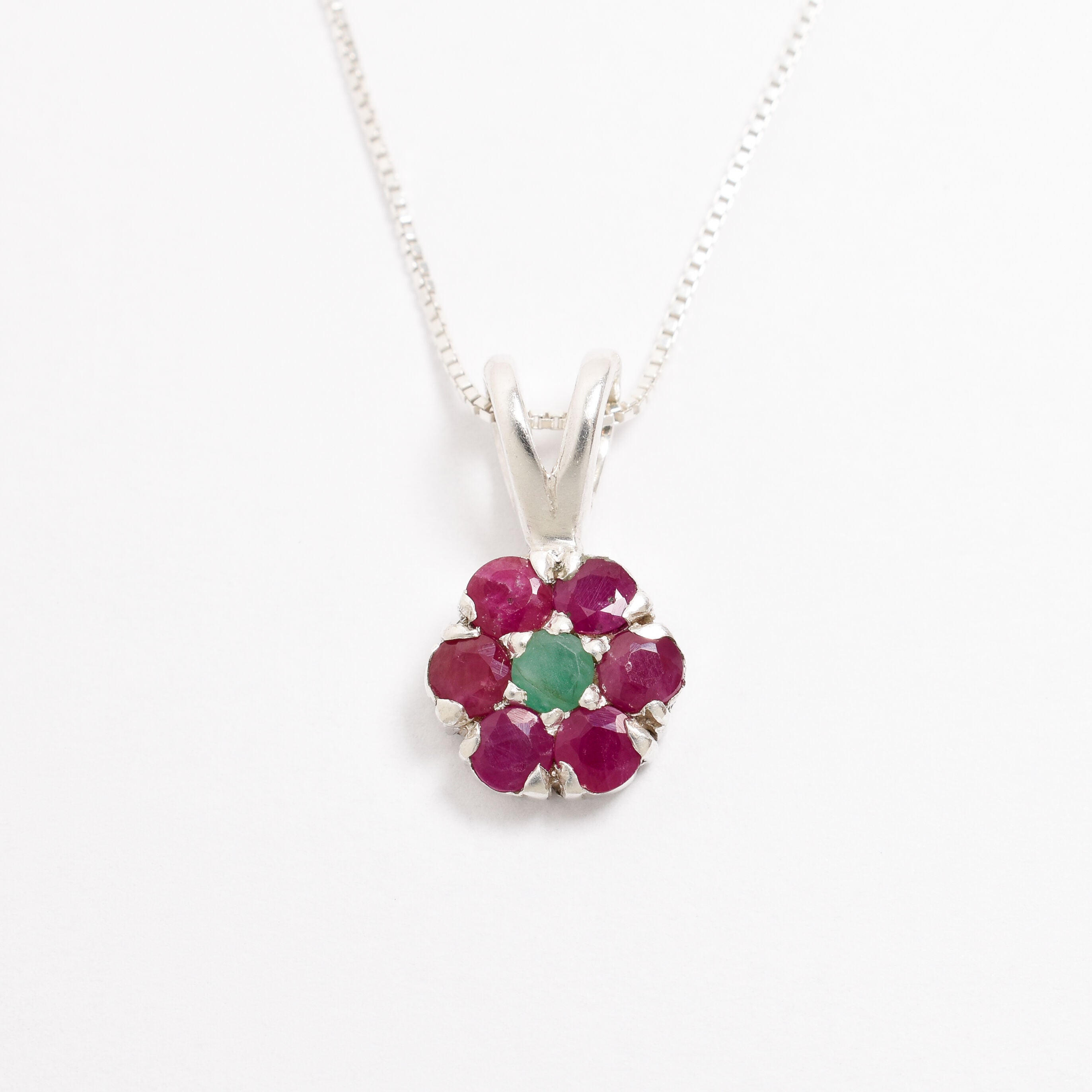 Natural Ruby Pendant made in 925 Sterling Silver with Round Natural Red Ruby in Cluster setting, July Birthstone gift idea, symbolizes nobility, purity, and passion, ideal for everyday wear and perfect for birthday gifting and special occasions.